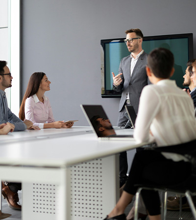 Corporate Wellness Programs, image of team in office working